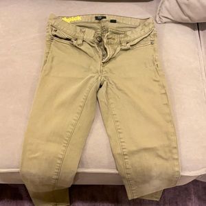 Army green toothpick jeans